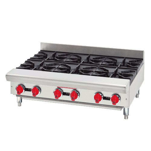 Stainless steel commercial stove with six burners on a white background