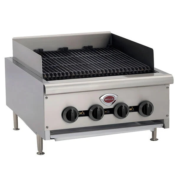 Stainless steel grill with four control knobs on a white background