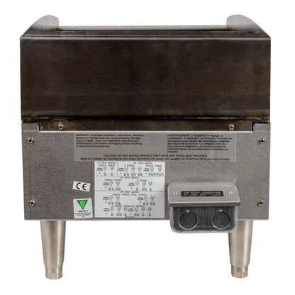 Back view of a metal appliance with a label and power outlets on a white background