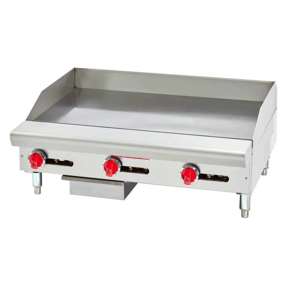 Stainless steel griddle with three red control knobs on a white background