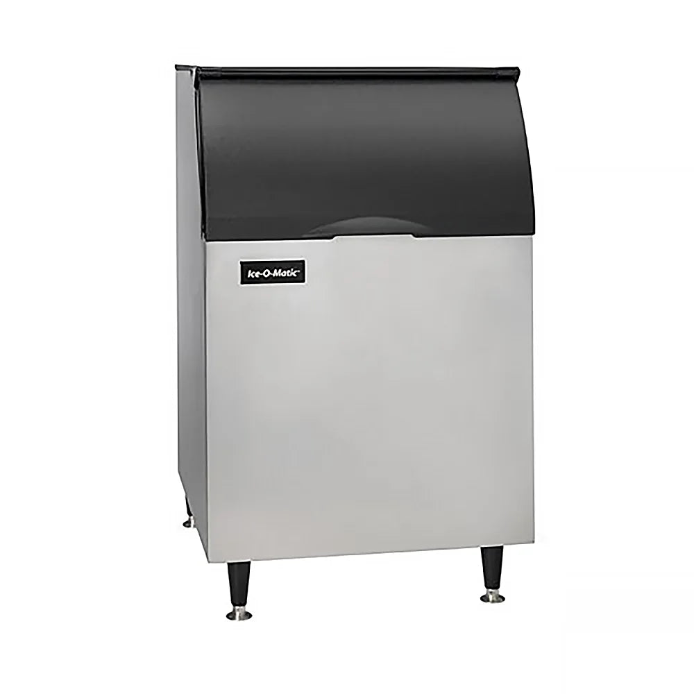 Ice machine with black top and silver body on a white background