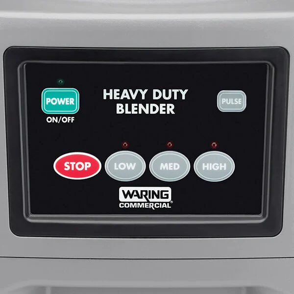 Control panel of a Waring Commercial heavy-duty blender with power, stop, low, medium, high, and pulse buttons.