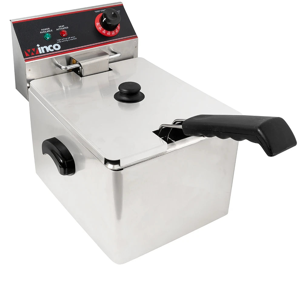 Stainless steel deep fryer with black handles on a white background