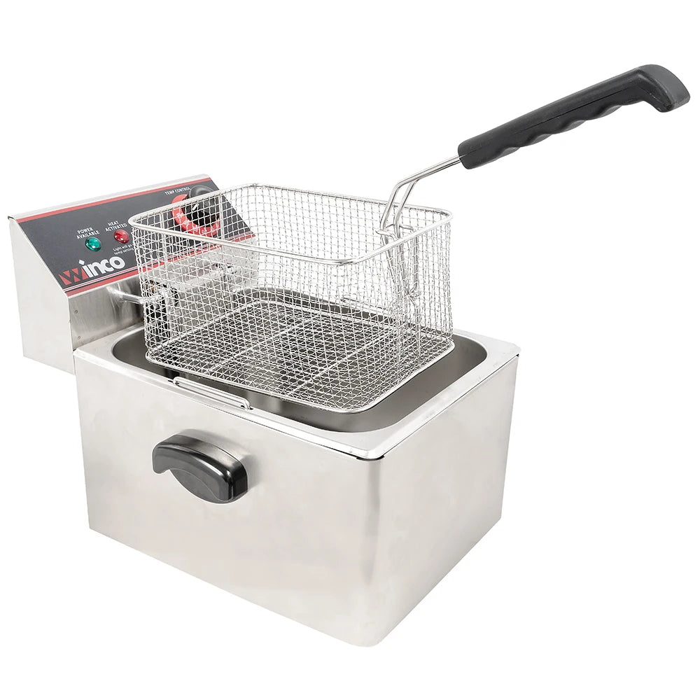 Stainless steel deep fryer with basket on a white background