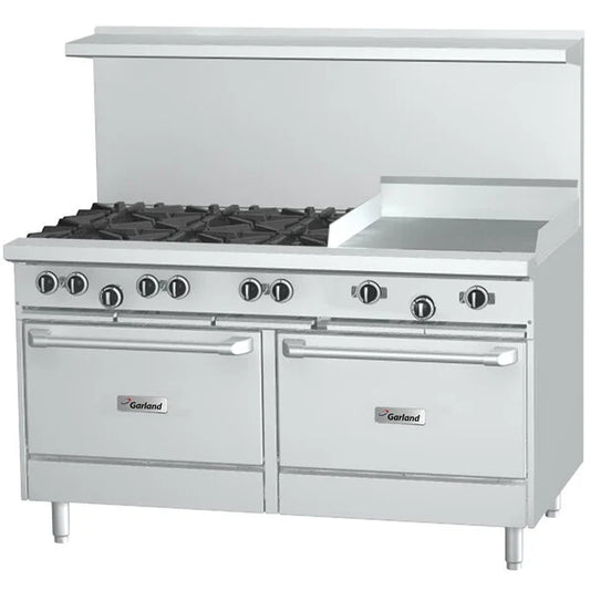 Stainless steel commercial range with multiple burners and griddle on a white background