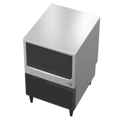 Ice machine with stainless steel top and black base on a white background