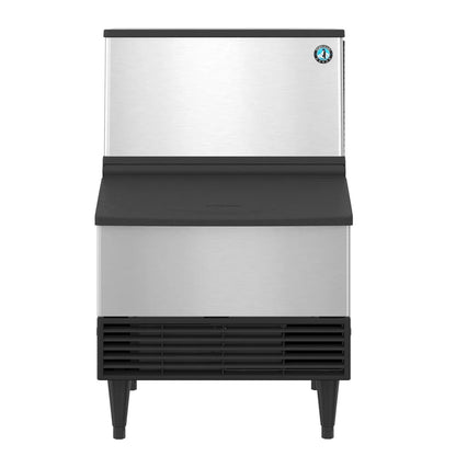 Ice machine with black base and silver top on a white background