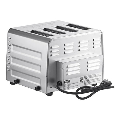 Silver toaster with four slots on a white background