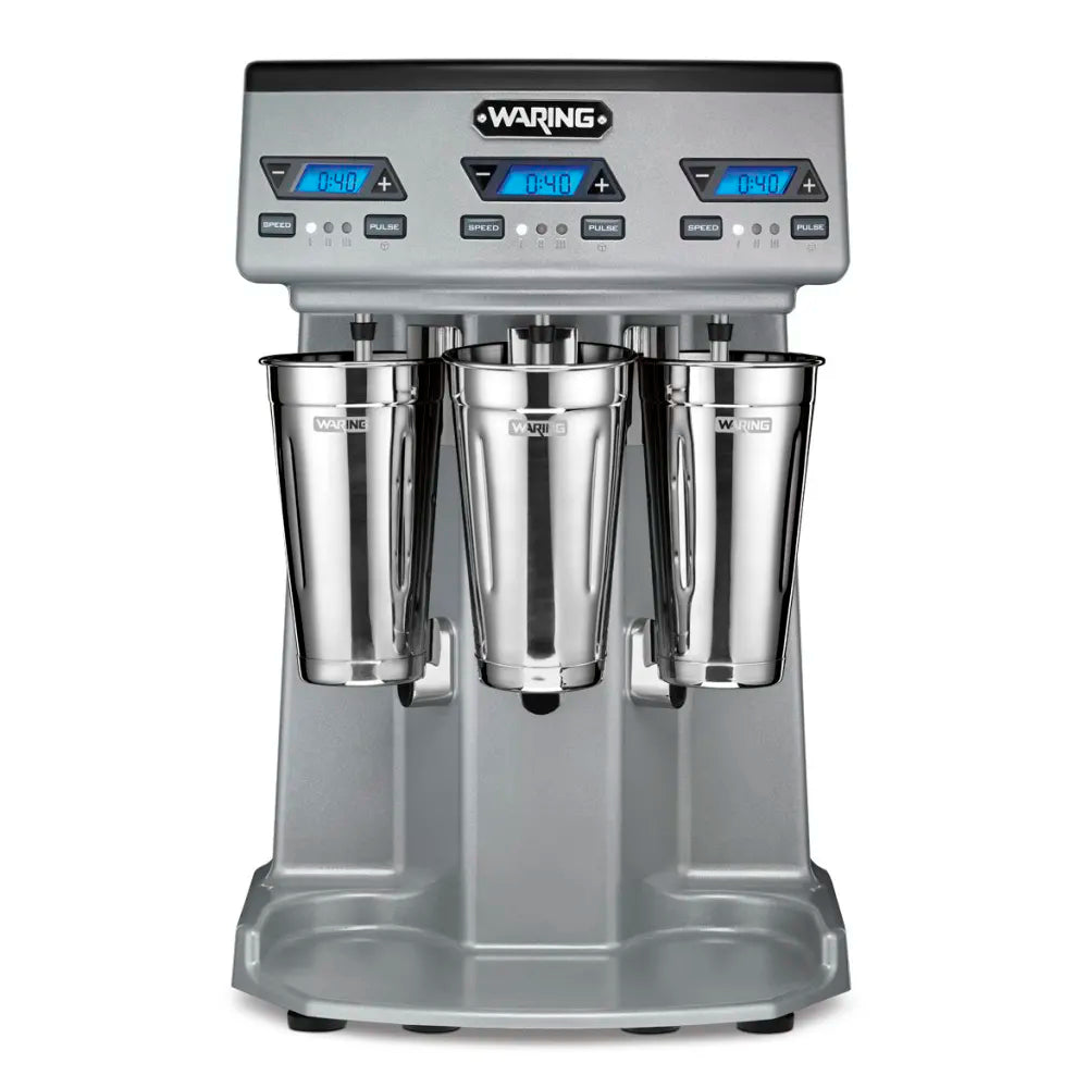 Waring three-bowl mixer on a white background