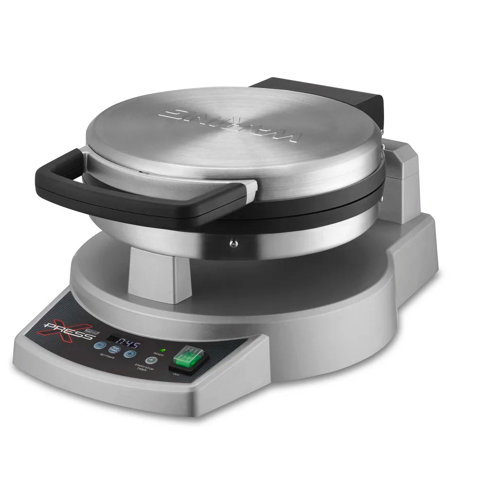 Silver waffle maker with digital display on a white background